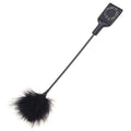 Fusta con brillos y pom pom